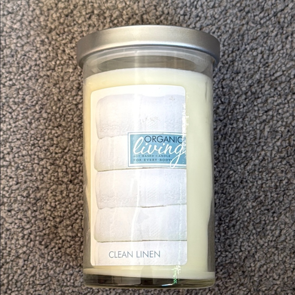 Clean Linen Candle by Organic Living - Creamy White. 18 oz. Includes wick clip.